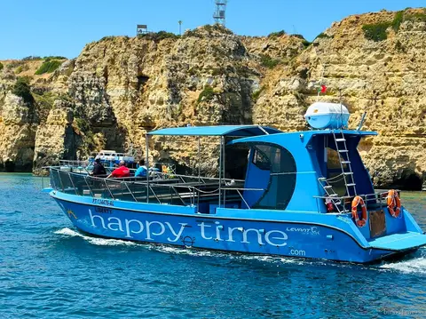 Catamaran departing Marina de Lagos on the Benagil Caves catamaran tour