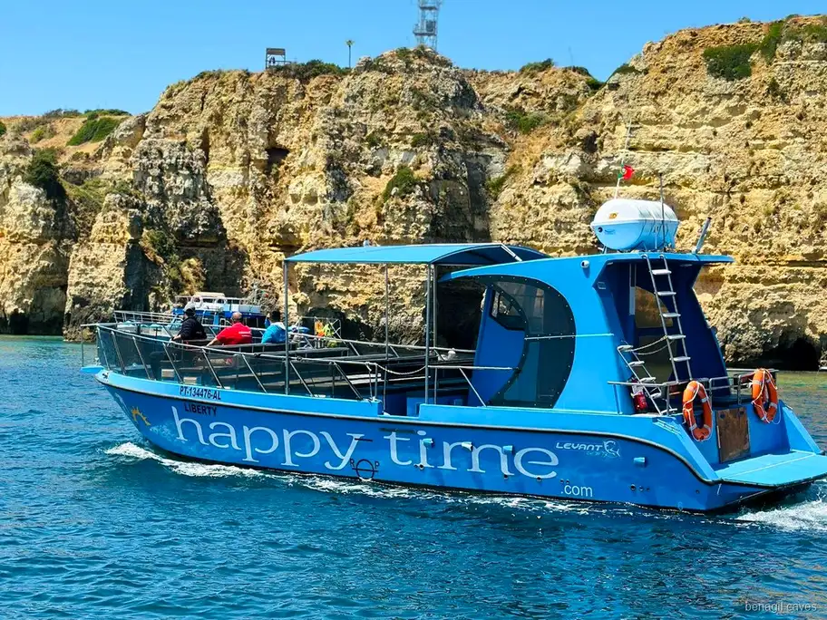 Catamaran departing Marina de Lagos on the Benagil Caves catamaran tour