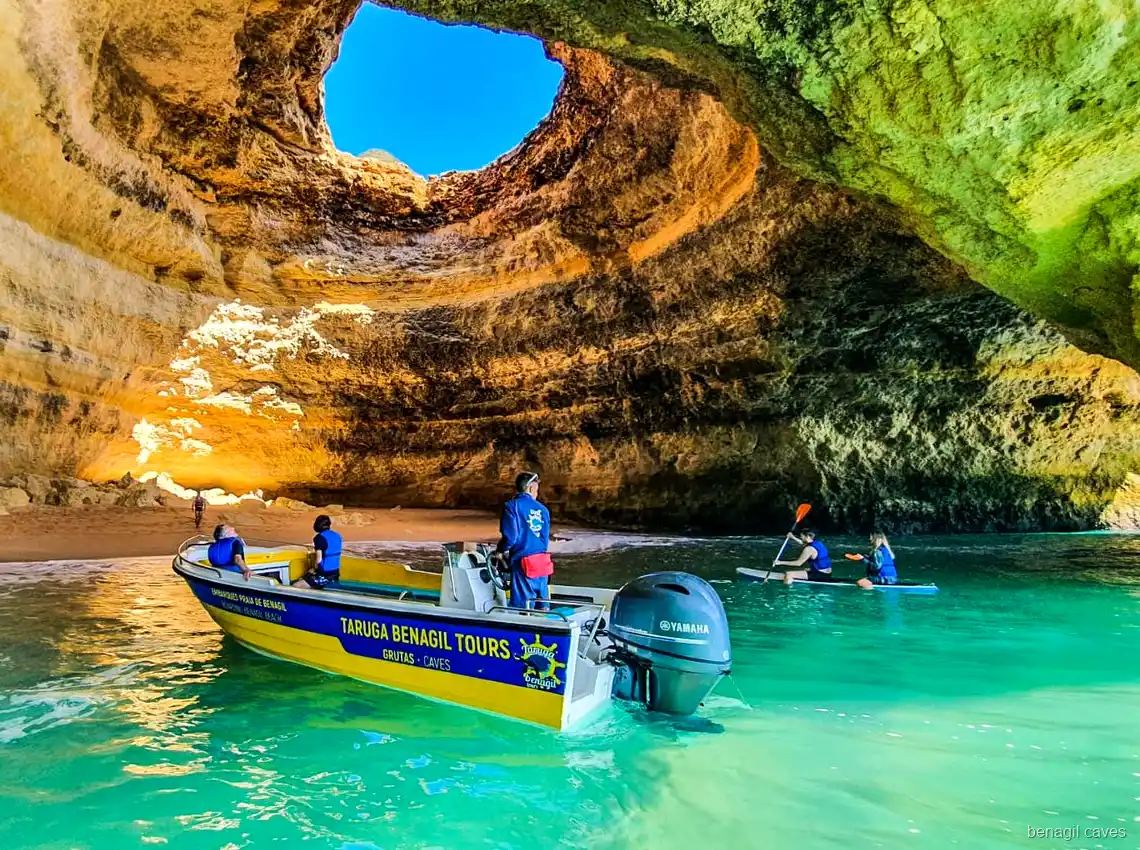 Golden sand chamber inside Algar de Benagil on the express boat tour