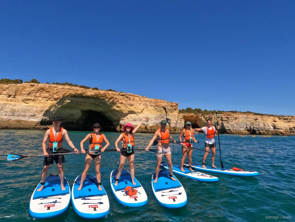 Guide leading a small group on the Benagil Caves paddleboard tour